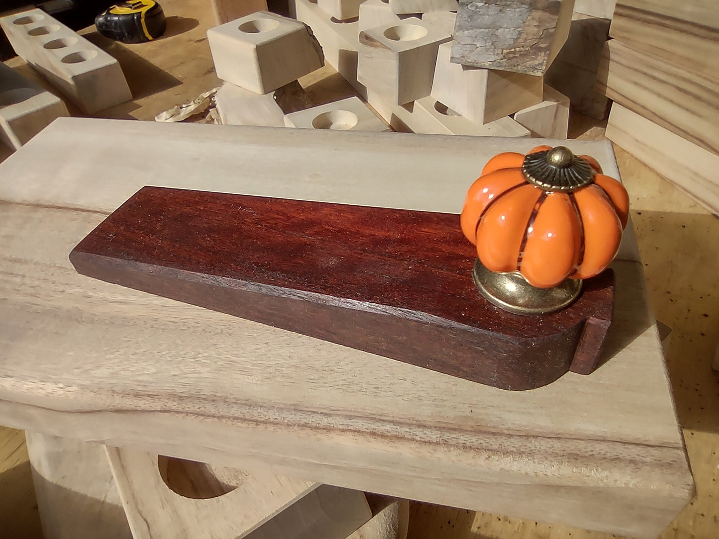 Door stop, Orange knob with Gold flutes on Red timber.