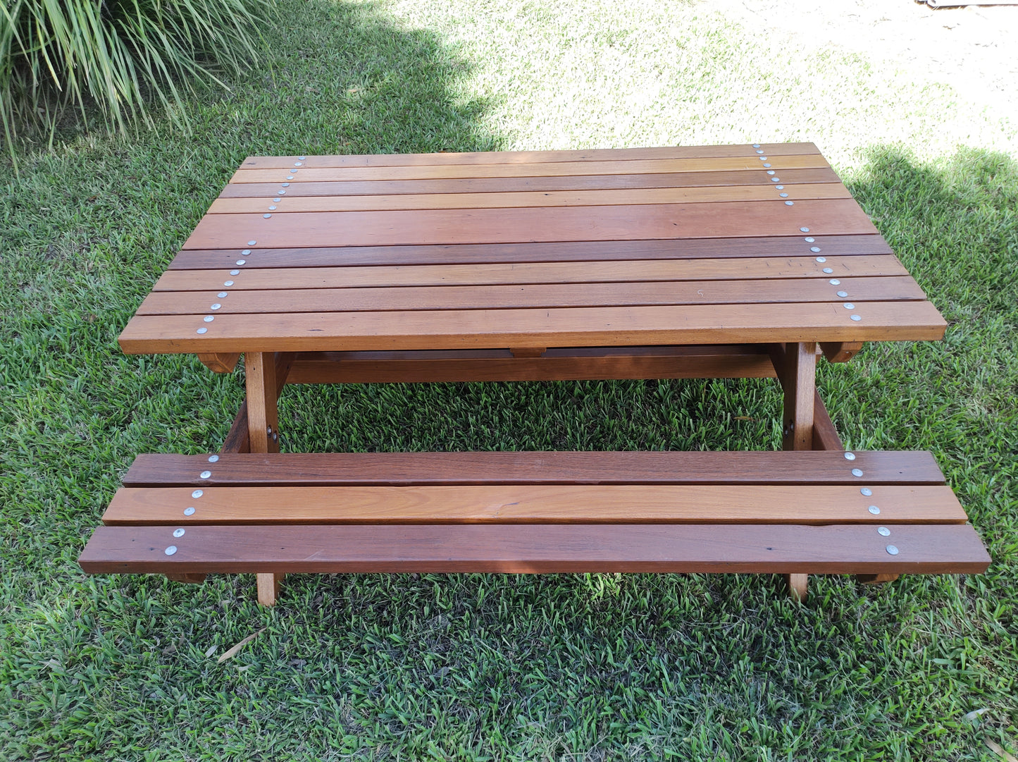 Picnic Table - With visible bolts.