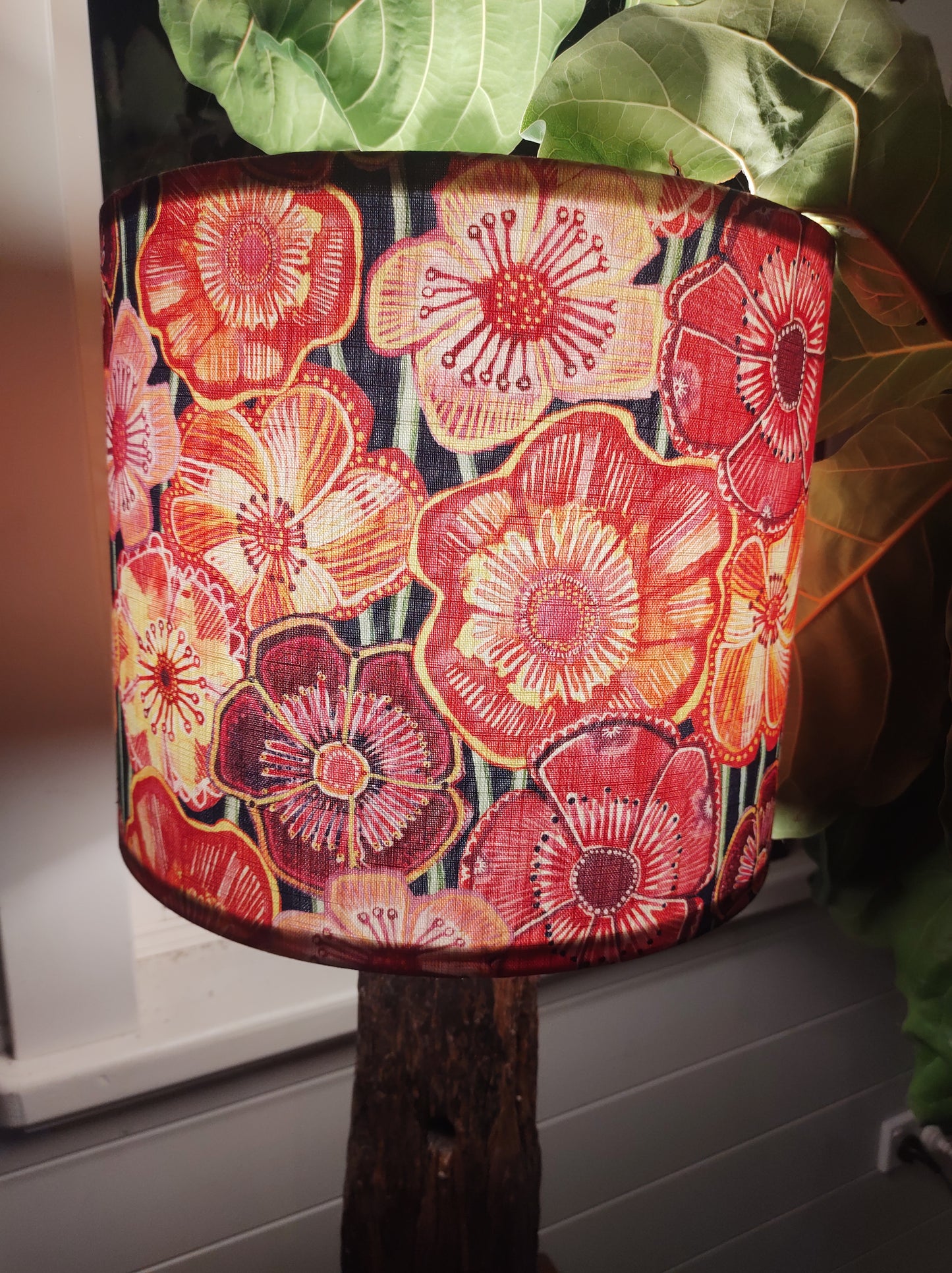 Table lamp including shade.