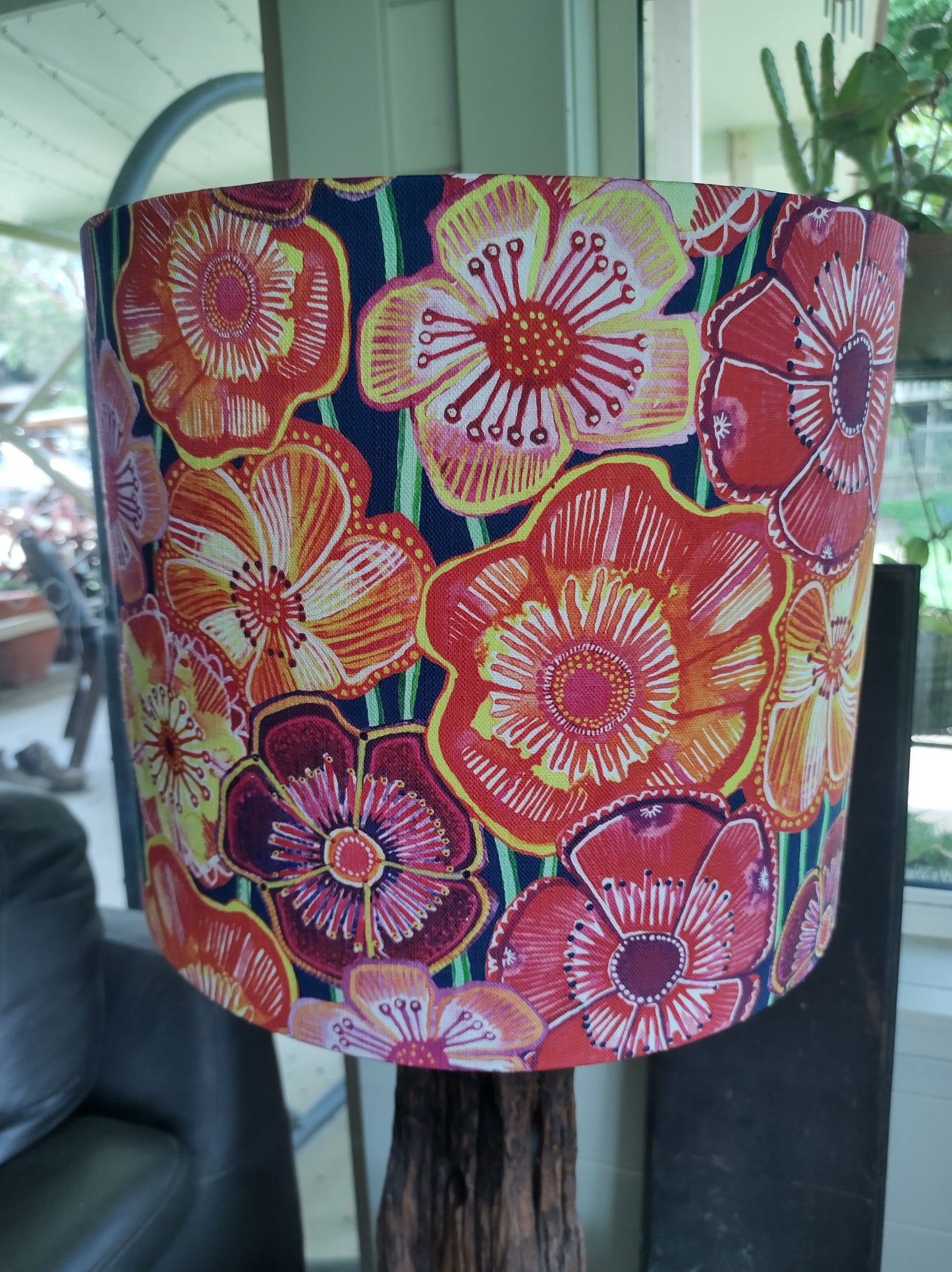 Table lamp including shade.