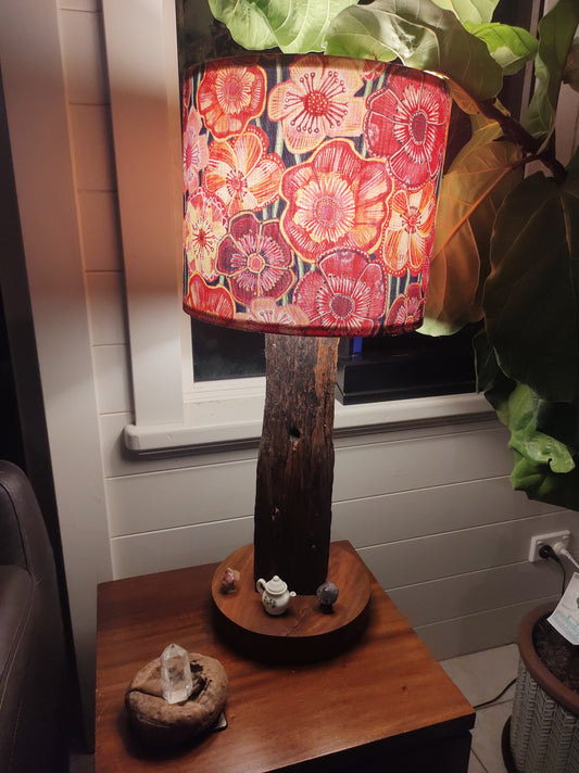 Table lamp including shade.